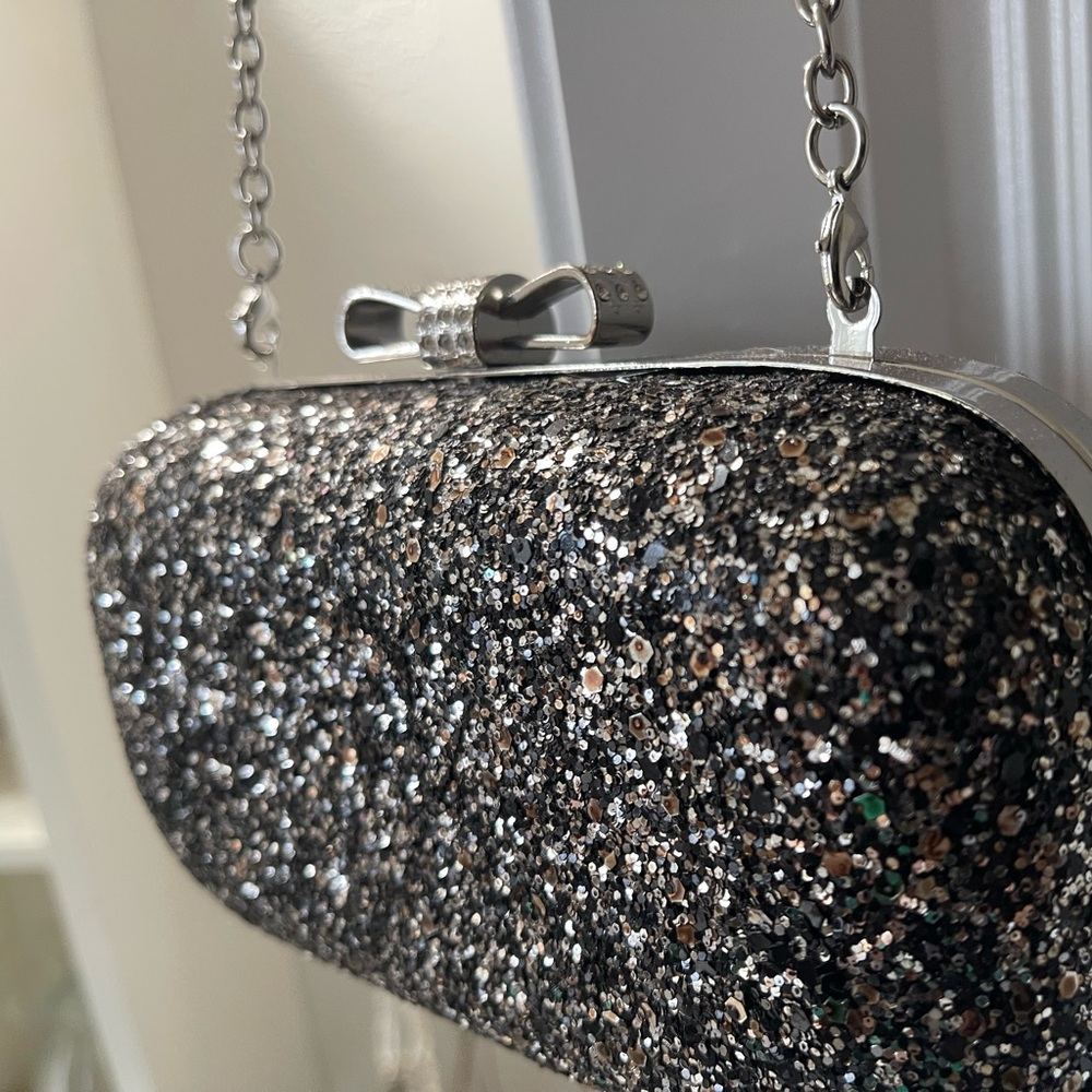 INC Evening Purse Glitter clasp close. Chain shoulder strap